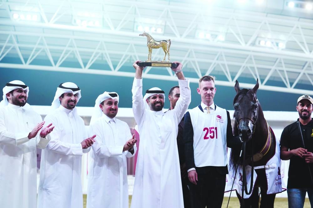 
The connections of Bashir Al Bashir celebrate after it won the Senior Stallions Championship title at the Al Shaqab International Arabian Horse Show. 