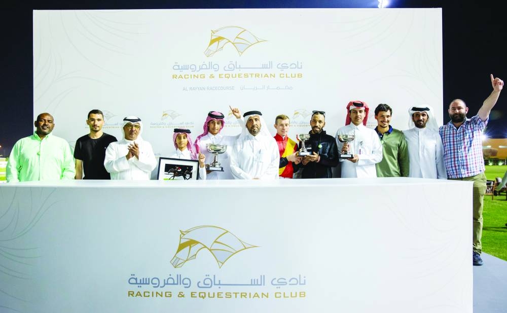 
Connections of Three Diamonds celebrate at the QREC’s Al Rayyan Racecourse yesterday. 