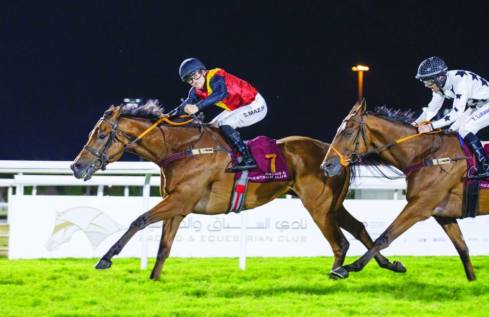 
Szczepan Mazur rides Three Diamonds to Al Ghashamiah Cup at the QREC’s Al Rayyan Racecourse yesterday. PICTURES: Juhaim 