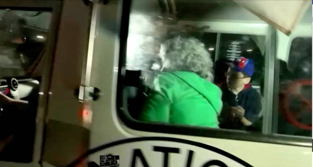 A vehicle carrying hostages arrives at the Rafah border, amid a hostages-prisoners swap deal between Hamas and Israel, from southern Gaza Strip Friday. REUTERS