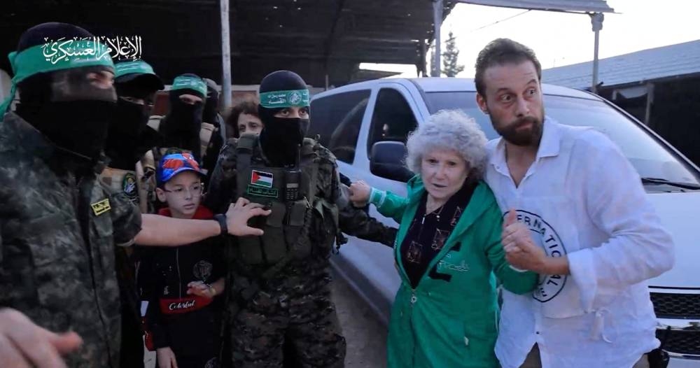 Israeli hostages are being handed over by Hamas to the International Red Cross, as part of a hostages-prisoners swap deal between Hamas and Israel amid a temporary truce, in an unknown location in the Gaza Strip, on Friday. Pictures: Hamas Military Wing/Handout via REUTERS
