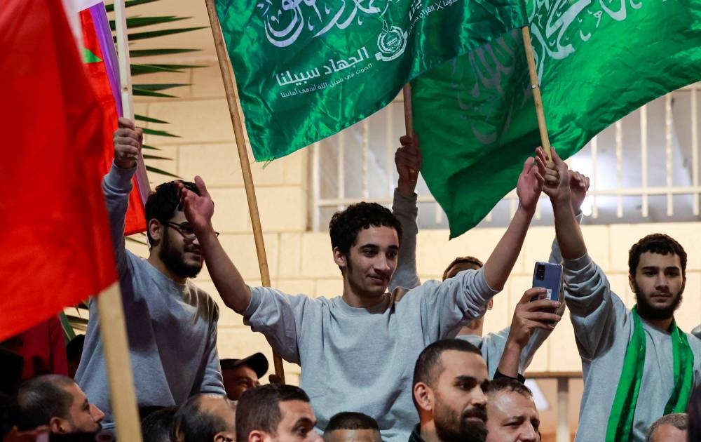 Released Palestinian prisoners react after leaving the Israeli military prison, Ofer, near Ramallah in the Israeli-occupied West Bank, on Sunday. REUTERS