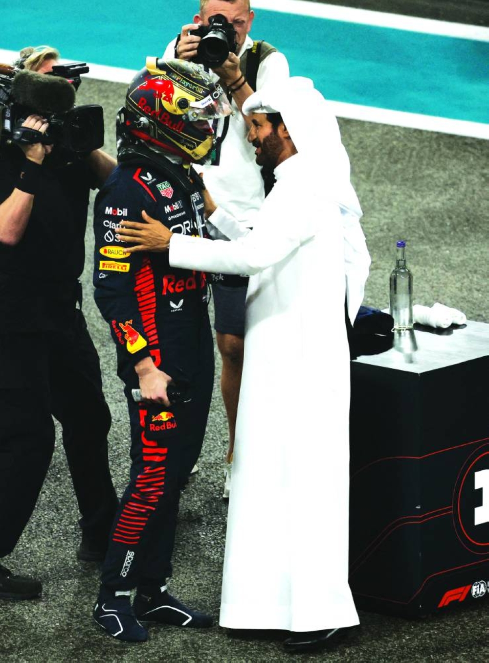 
Red Bull’s Max Verstappen with FIA president Mohammed Ben Sulayem after winning the race. (Reuters) 