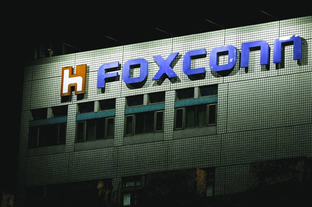 The logo of Foxconn is seen outside a building in Taipei. Hon Hai, also known as Foxconn, and other Taiwanese electronics manufacturers continue to diversify their businesses outside of China as tensions rise between Washington and Beijing.