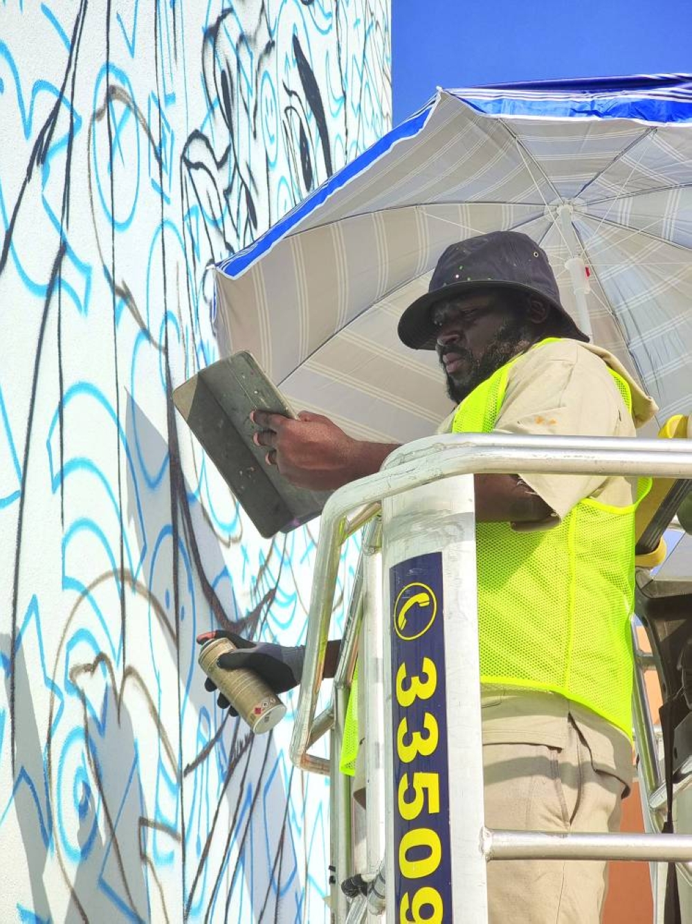 Mohammed Awudu engaged in artistic creation at the Mina District Monday. PICTURE: Joey Aguilar