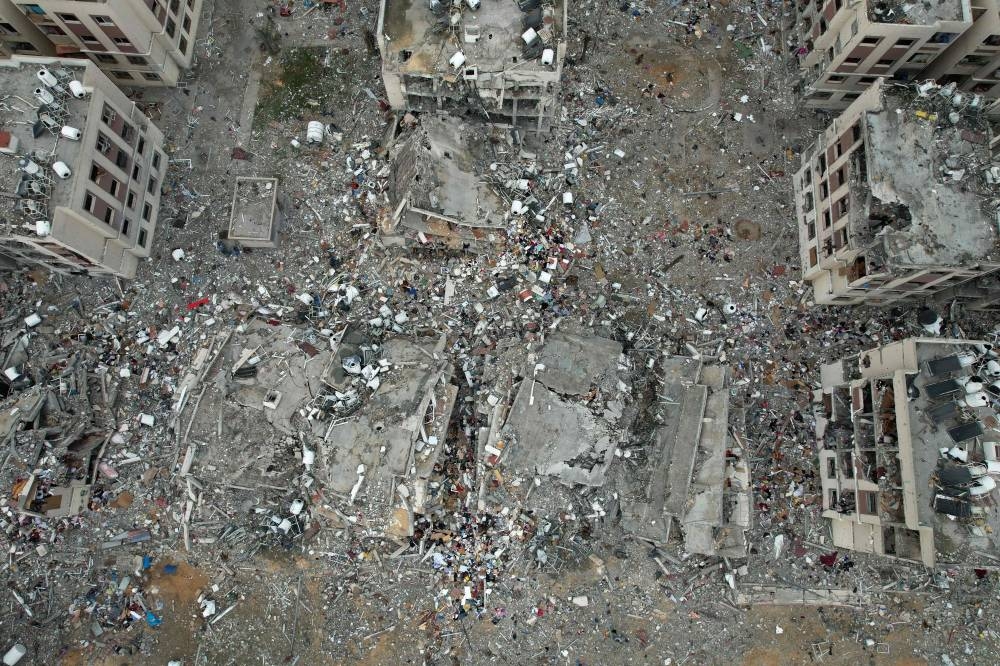 An aerial view shows the destruction caused by Israeli strikes in Wadi Gaza, in the central Gaza Strip, on Tuesday. AFP
