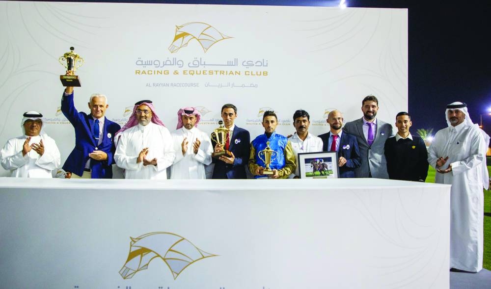 Sheikh Mohamed bin Faleh al-Thani presented the trophies to connections of Wathnan Racing’s Kovanof at the Al Rayyan Racecourse yesterday. PICTURES: Juhaim