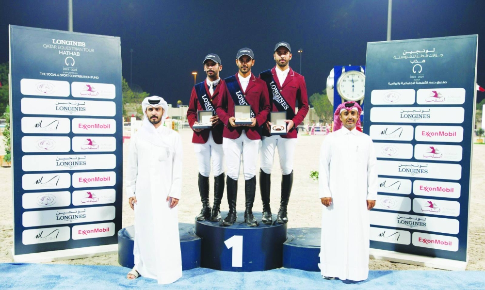 
Abdullah al-Qashouti, Media Director, Longines Hathab, honoured the top three finishers of the Open Class at the outdoor arena of Qatar Equestrian Federation yesterday. 