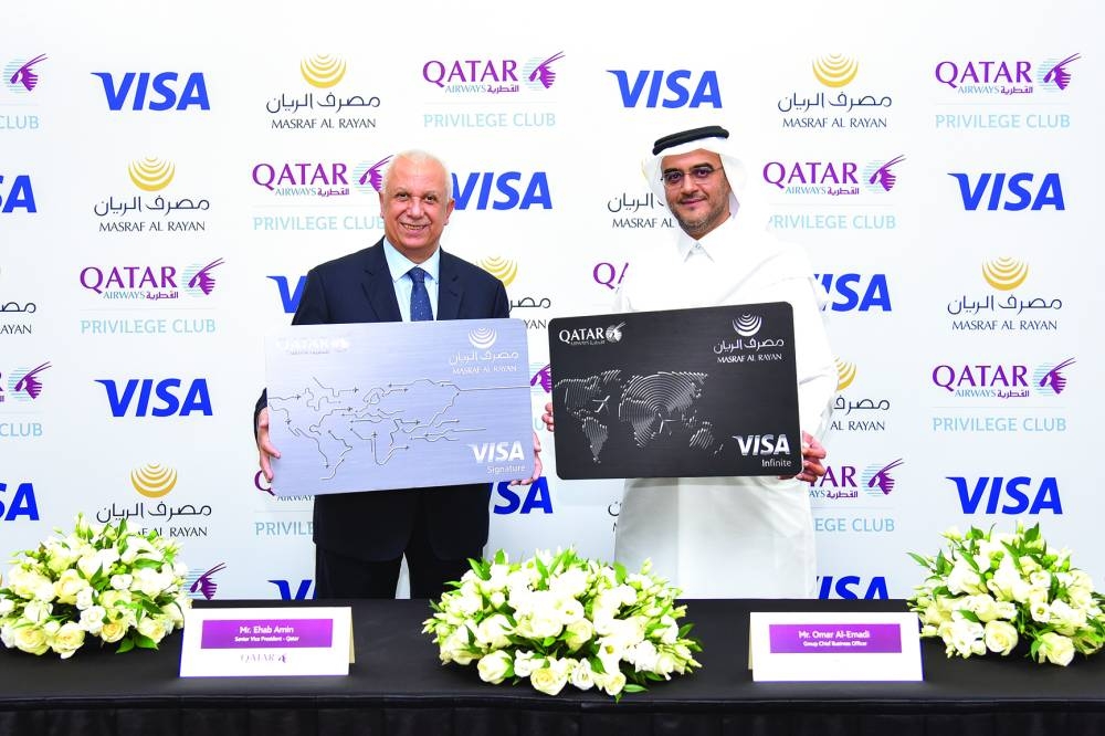 Ehab Amin and Omar al-Emadi at the launch of co-branded credit card.