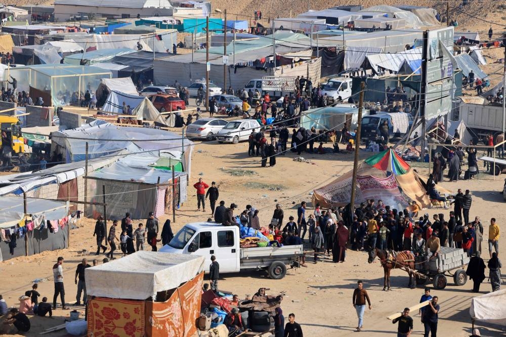 Displaced Palestinians who fled Khan Yunis set up camp in Rafah further south near the Gaza Strip's border with Egypt, on Wednesday. AFP