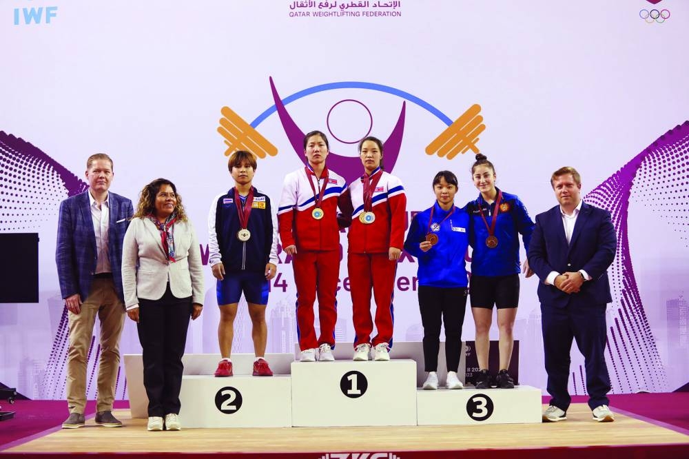 
Medal winners in the women’s 55kg pose for a group photograph. 