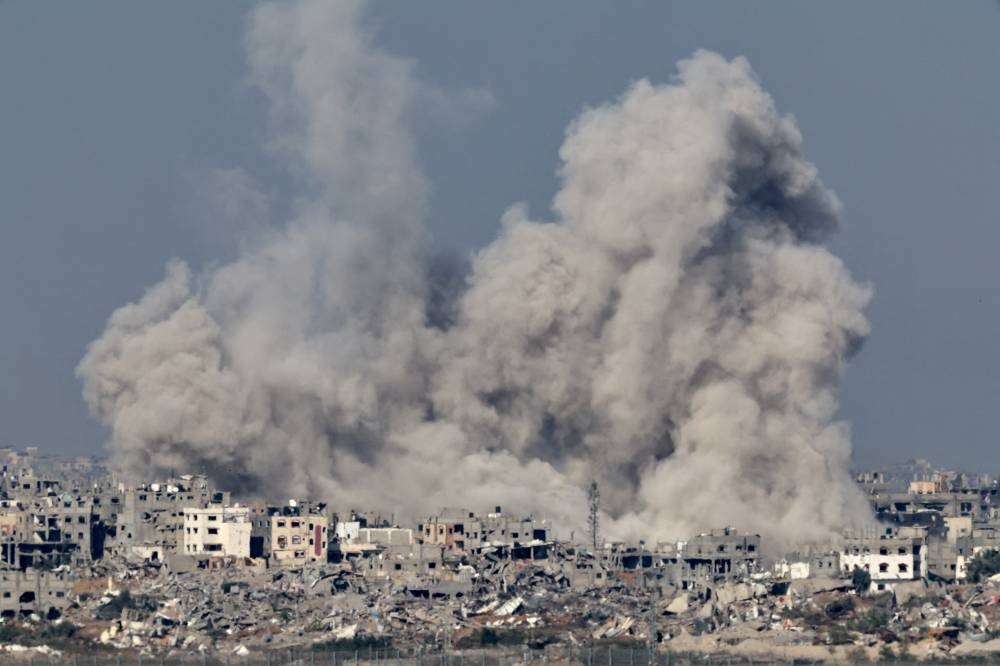 Smoke rises over Gaza as seen from southern Israel, on Friday. REUTERS