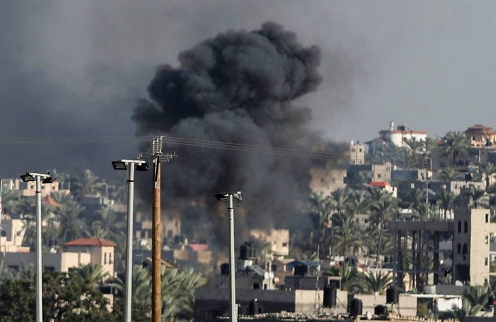 Smoke rises after an Israeli airstrike in Khan Younis, southern Gaza Strip, on Saturday. REUTERS