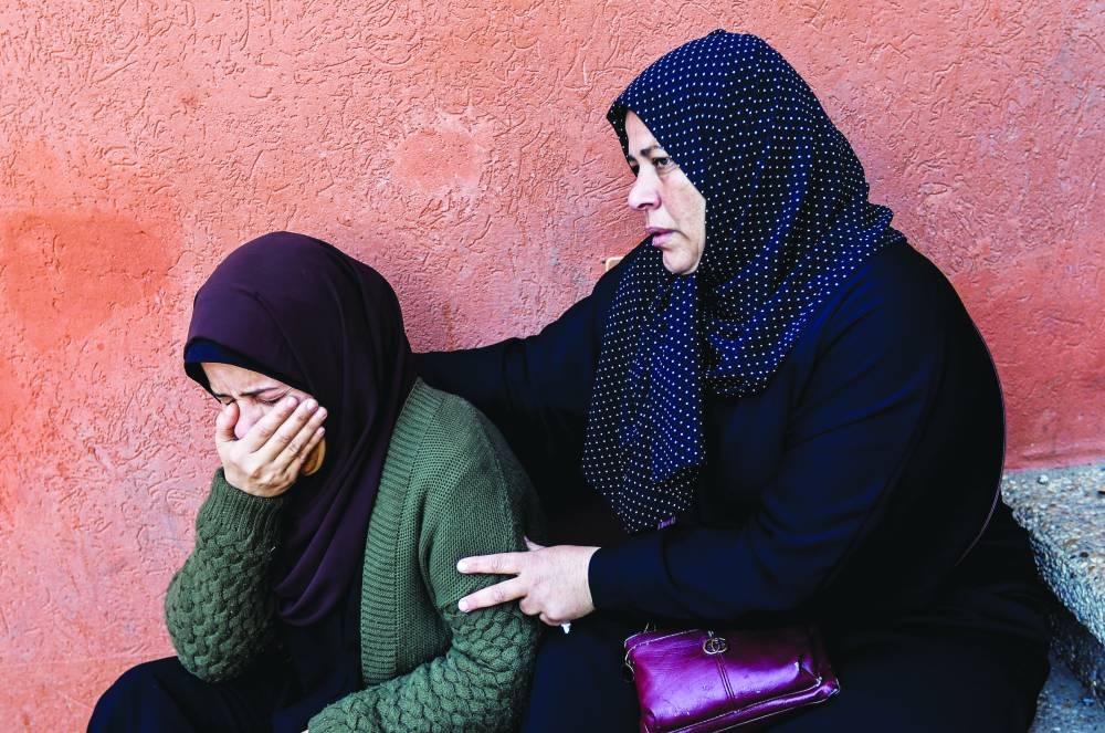 
Women mourn during a funeral for Palestinians killed in Israeli strikes, amid the ongoing conflict, during a funeral at Nasser hospital in Khan Yunis in the southern Gaza Strip, yesterday. 