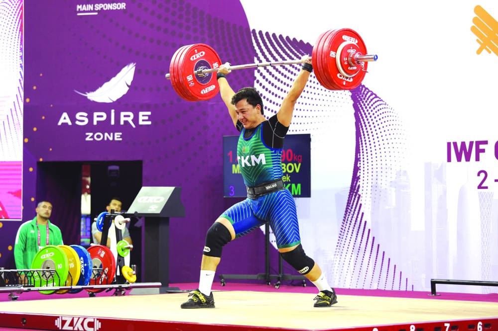 
Turkmenistan’s Shahzadbek Matyakubov make a successful lift en route to winning the men’s 96kg gold at the Aspire Zone yesterday. 