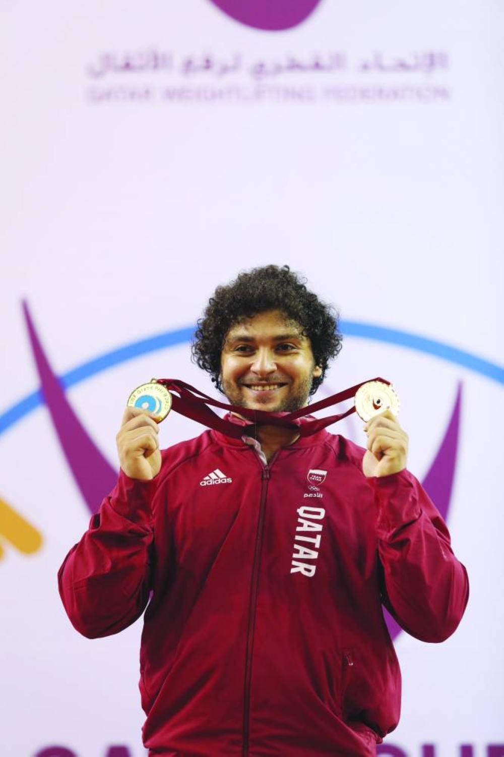 
Fares Ibrahim celebrates with his medals at Aspire Zone yesterday. 