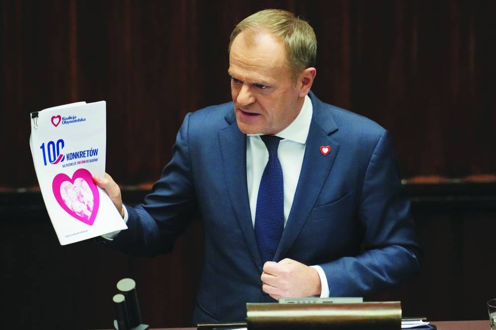 
Newly appointed Polish Prime Minister Donald Tusk presents his government’s programme and asks for a vote of confidence in 
Parliament in Warsaw yesterday. (Reuters) 