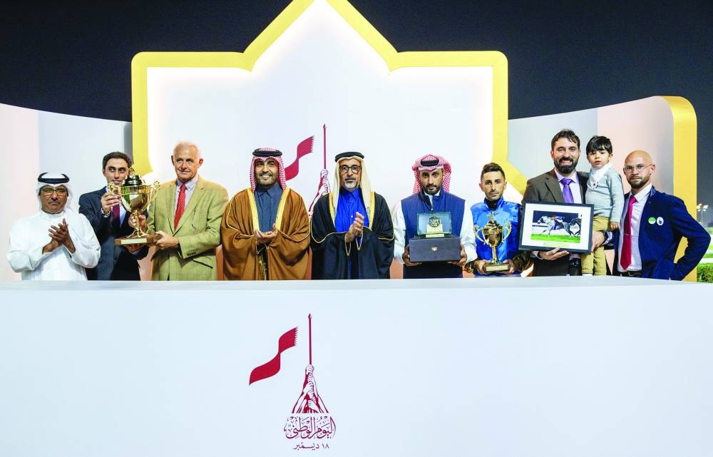 Minister of Sports and Youth HE Salah bin Ghanem bin Nasser al-Ali and QREC Chairman Issa Bin Mohamed al-Mohannadi presented the trophies to connections of Wathnan Racing’s Bakir, which won the Late Sheikh Jassim Bin Mohamed Trophy at the Qatar Racing & Equestrian Club on Saturday. PICTURES: Juhaim
