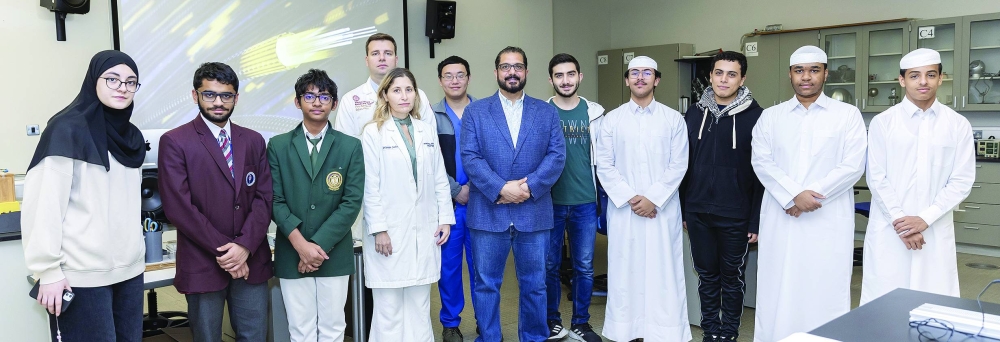 Dr Mohammad Yousef (center) with WCM-Q instructors Hana Saba and Branislav Alaksic, plus local high school students at a training workshop for the recent International Juniors Science Olympiad (IJSO). PICTURE:  www.absharphotography.com