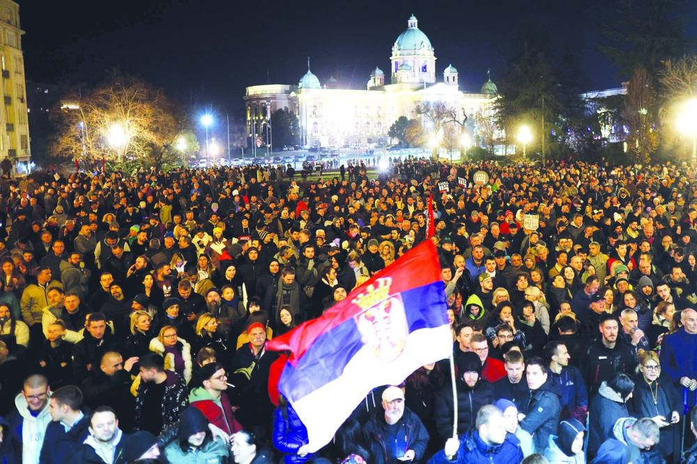  during a demonstration in Belgrade, on December 24, 2023, a week after the parliamentary and local elections in Serbia. Serbia announced plans on December 20, to rerun elections in 30 polling locations, according to state media, just days after nationwide parliamentary and local elections triggered protests and international condemnation over alleged fraud.  "The Serbian electoral commission decided that parliamentary elections in Serbia will be repeated at 30 polling stations and will be held on December 30," said a statement published by state-run broadcaster RTS. (Photo by OLIVER BUNIC / AFP)