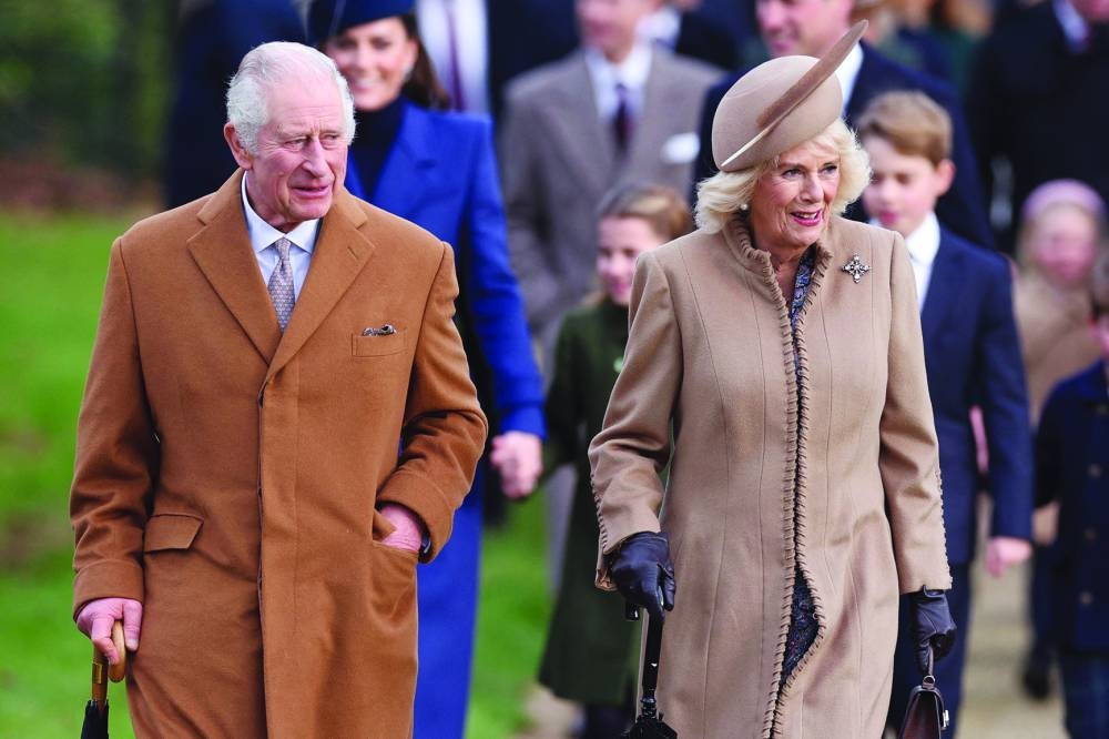 
King Charles III and Queen Camilla arrive for the Royal Family’s traditional Christmas Day service. 