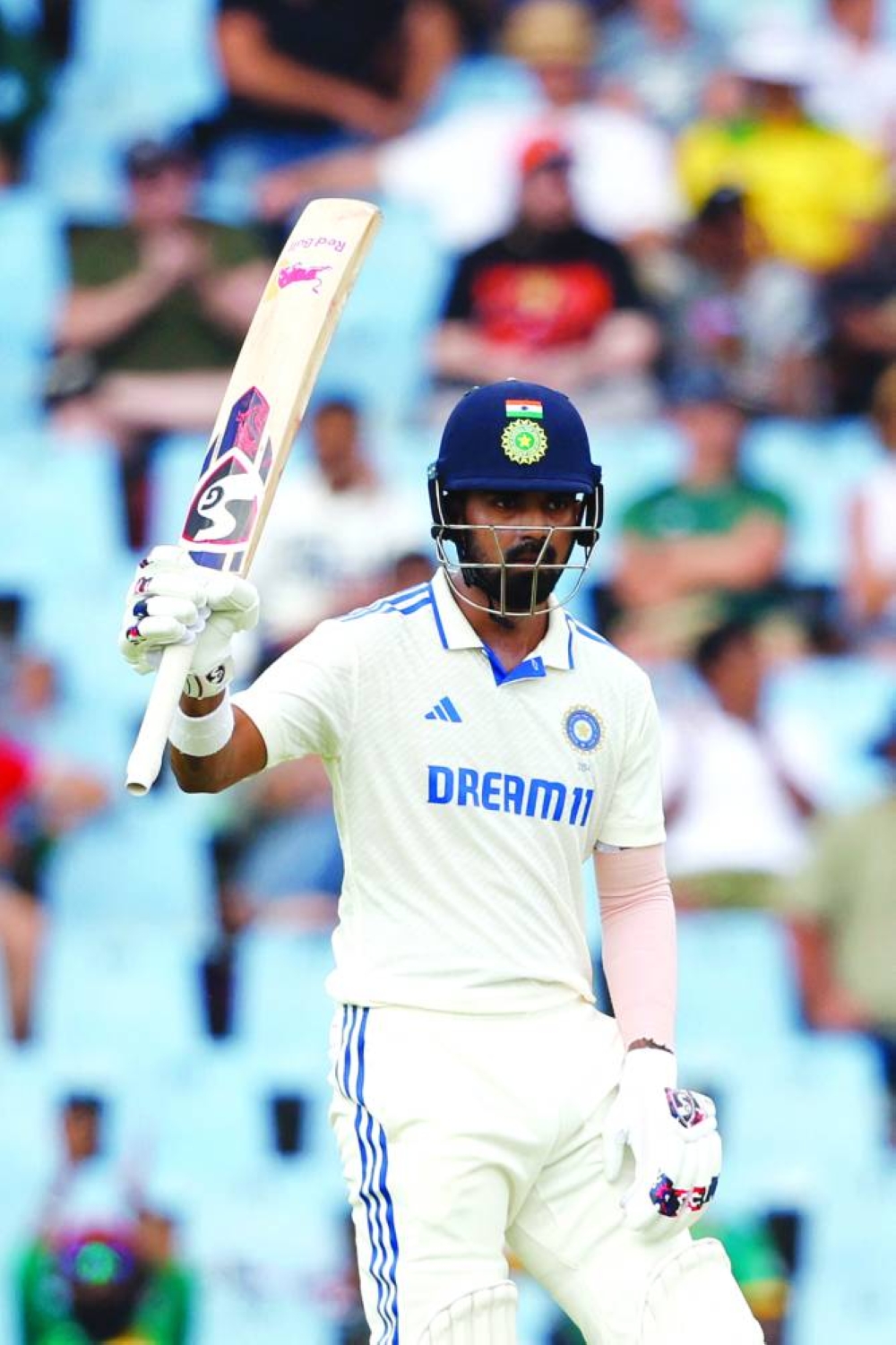 India’s K L Rahul celebrates after scoring his half-century on Tuesday. (AFP)