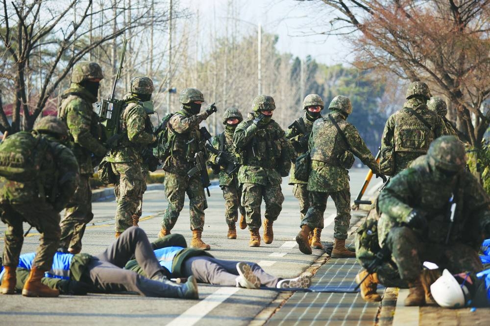 
South Korean soldiers take part in an anti-terror drill against North Korea’s possible provocations amid mounting tensions on the Korean peninsula, in Seoul. 