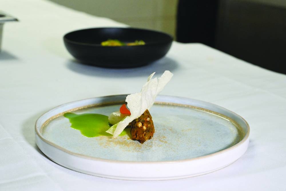 
A view of the puffed cassava chips, placali with grilled okra, served at the Maison Palmier restaurant in Abidjan. 
