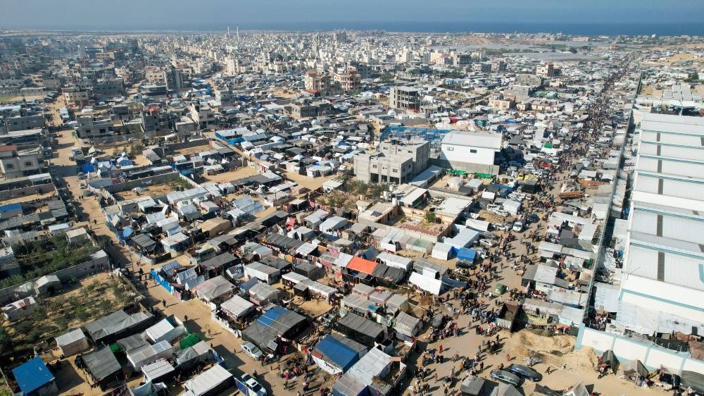 Displaced Palestinians, who fled their homes due to Israeli strikes, shelter in a tent camp, in Rafah, southern Gaza Strip, on Friday. REUTERS