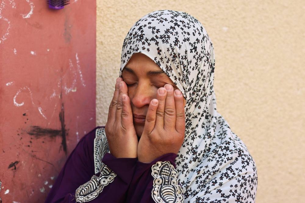 Suzan Khader, a displaced Palestinian woman from Gaza City, inside her tent in Rafah, southern Gaza Strip, on Sunday. REUTERS
