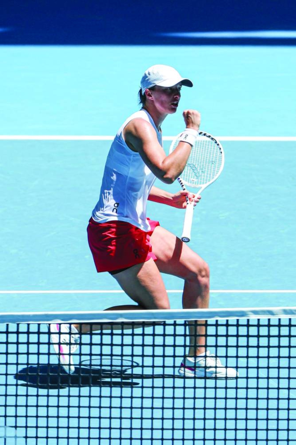 Poland’s Iga Swiatek celebrates after winning against Spain’s Sara Sorribes Tormo in their United Cup match in Perth on Monday. (AFP)