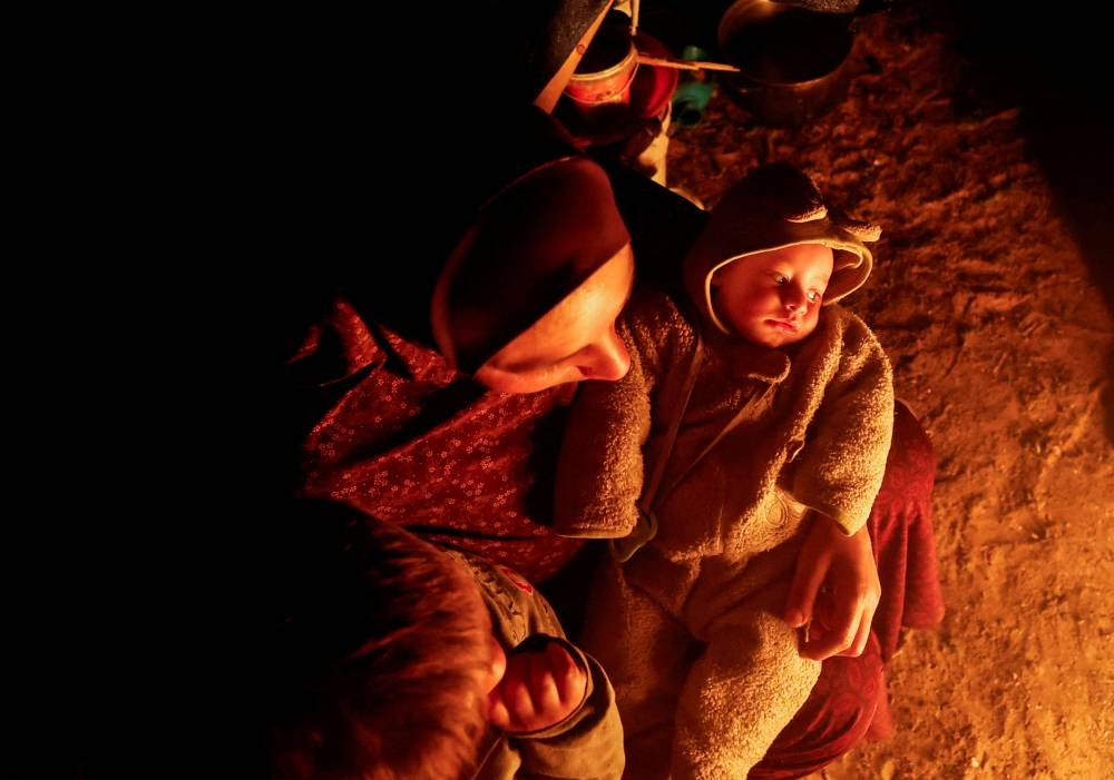 Palestinians who fled their houses due to Israeli strikes shelter in a tent in Rafah, in the southern Gaza Strip on Tuesday. REUTERS