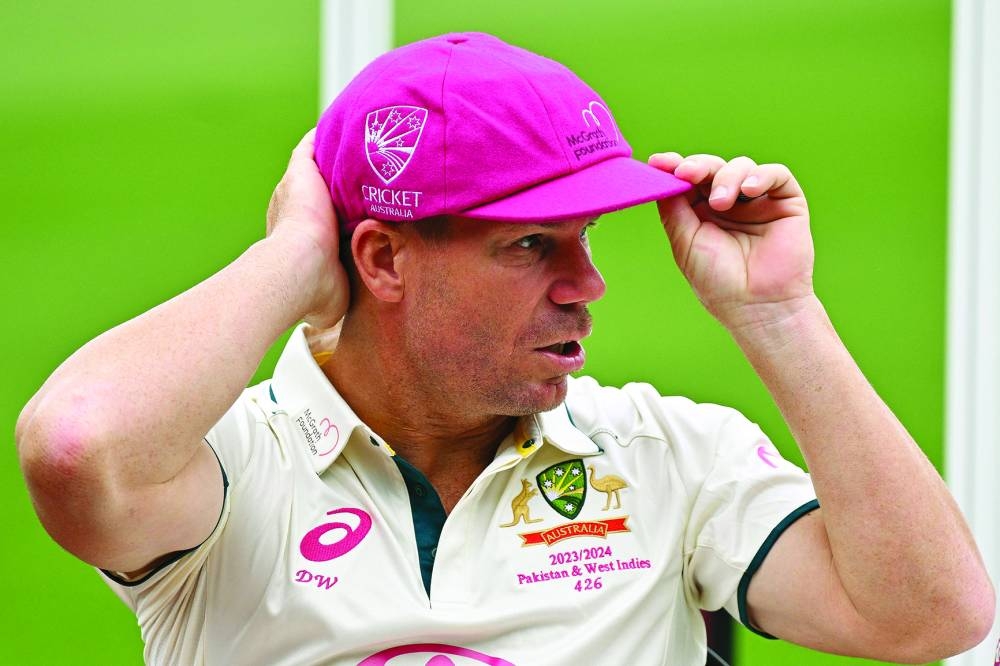 
Australia’s David Warner looks on before a team photo ahead of the third Test against Pakistan at the SCG in Sydney. (AFP) 