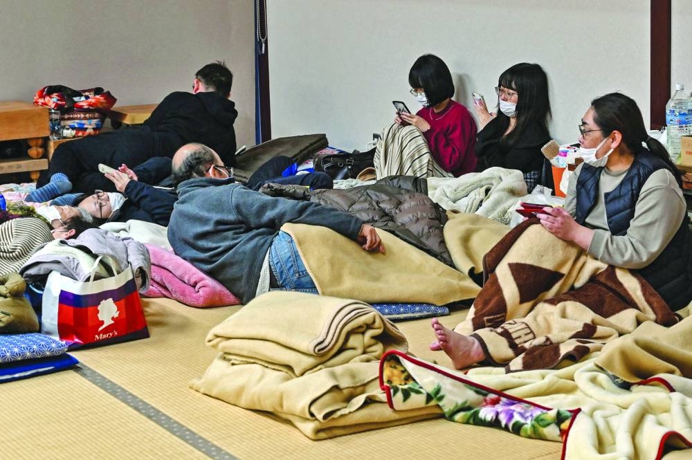 
Evacuees rest at a shelter in Nanao, Ishikawa. 