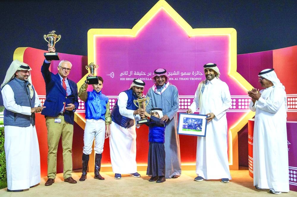 His Highness Sheikh Abdullah bin Khalifa al-Thani awarded the trophies to connections of Wathnan Racing’s Razy, in the presence of Issa bin Mohamed al-Mohannadi, QREC Chairman at the Rayan Racecourse on Thursday. PICTURES: Juhaim