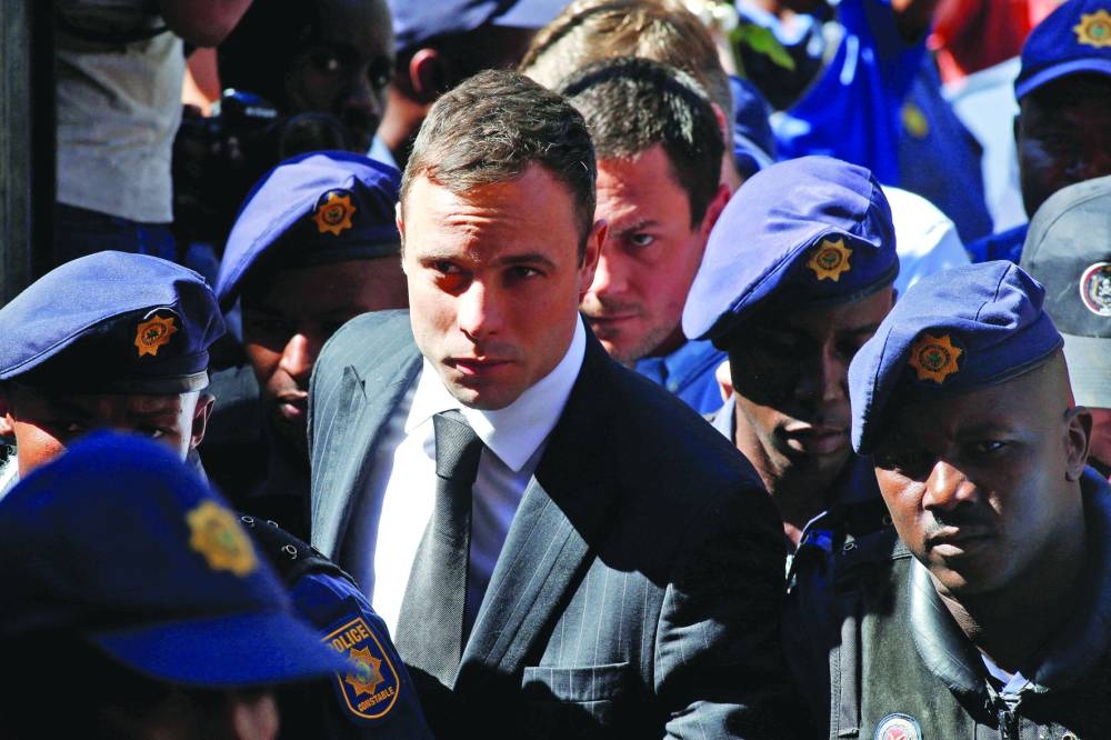 This picture taken on October 21, 2014 shows Pistorius arriving at the North Gauteng High Court in Pretoria.