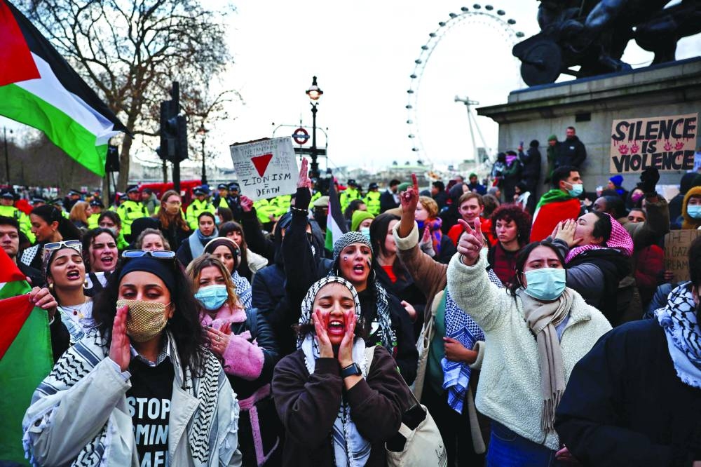 Palestinian supporters take part in a demonstration in central London calling for a ceasefire now in the war in Gaza.