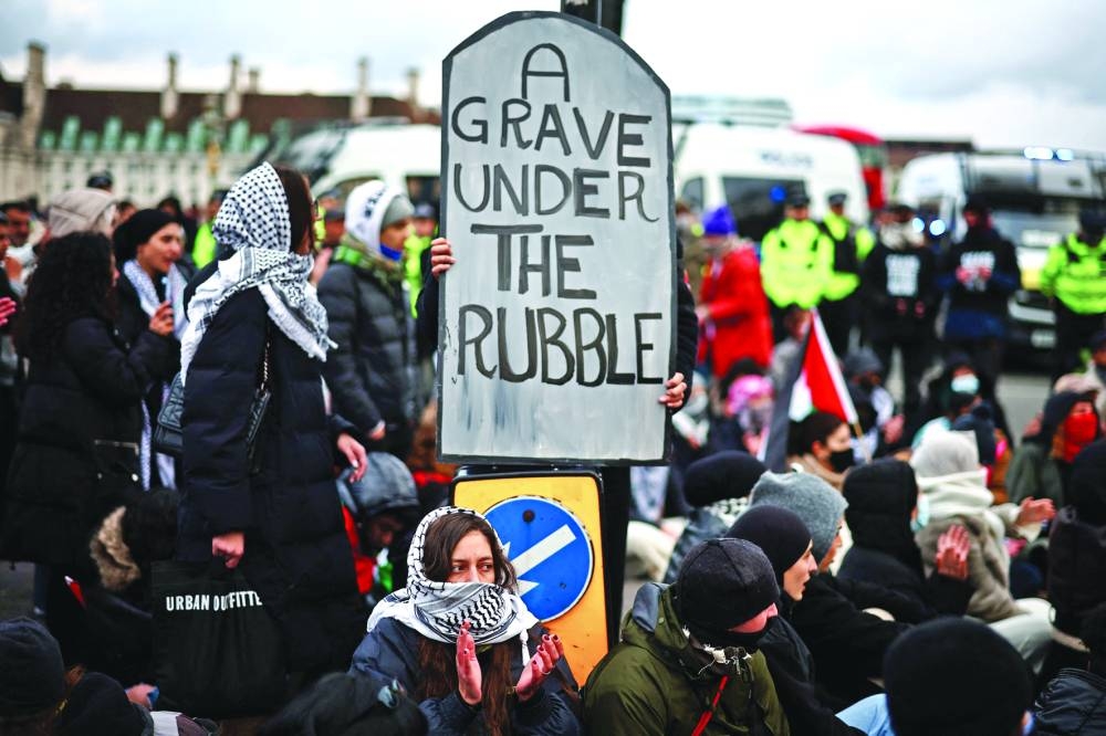 Palestinian supporters take part in a demonstration in central London calling for a ceasefire now in the war in Gaza.
