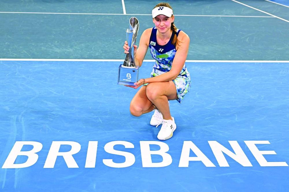 
Elena Rybakina of Kazakhstan holds the winners trophy after the singles final against Aryna Sabalenka of Belarus at the Brisbane International yesterday. (AFP) 