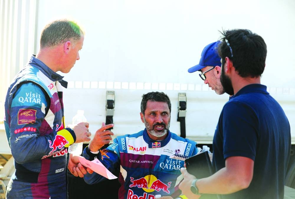  Nasser Racing’s Nasser al-Attiyah and Mathieu Baumel after stage 3 on Monday. (Reuters)