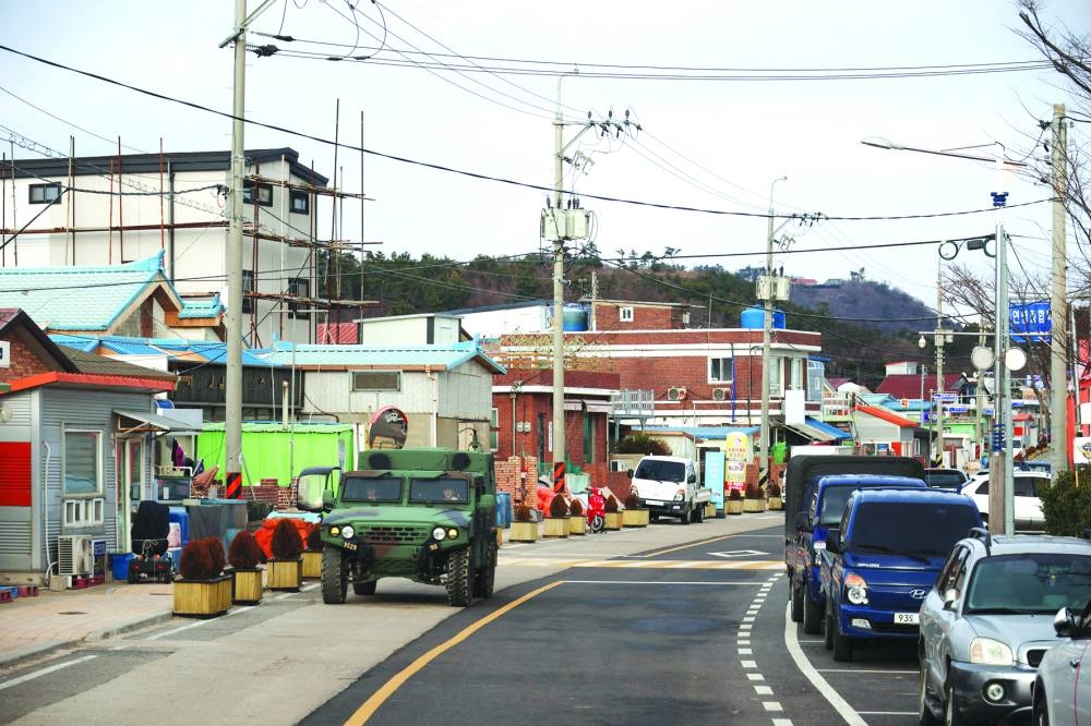 
A military vehicle moves on Yeonpyeong Island, South Korea. 