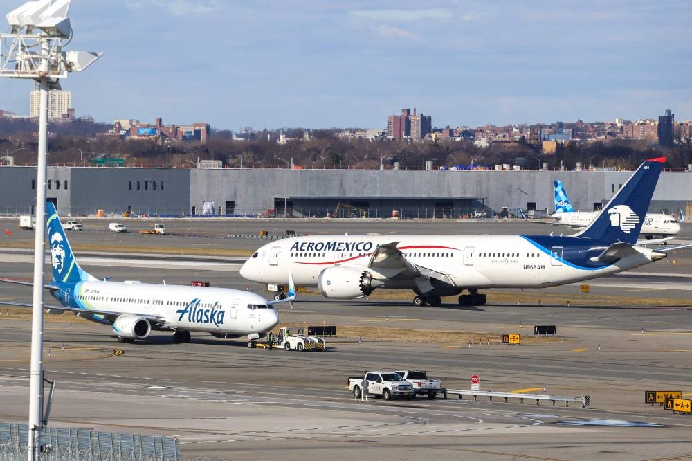 A Boeing 737-900er passengers aircraft of Alaska Airlines on its way to San Francisco is seen before take-off at John F. Kennedy Airport on Monday. AFP