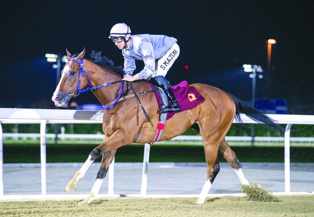 Jockey Szczepan Mazur guides X Force to Ras Laffan Cup win on Wednesday.