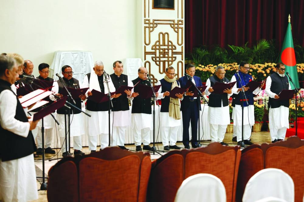 
Members of the new cabinet take oath at Bangabhaban in Dhaka. 