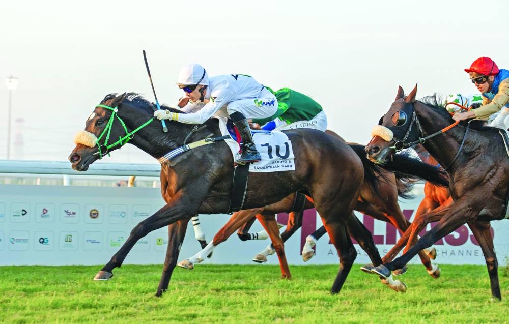 Jockey Carlos Henrique guides Al Harqah to Al Waab Cup victory on Thursday.