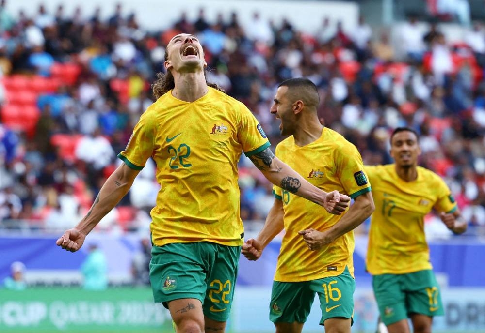 Australia's Jackson Irvine celebrates scoring their first goal. REUTERS