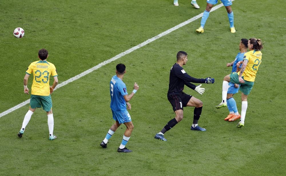 Australia's Jackson Irvine scores their first goal. REUTERS