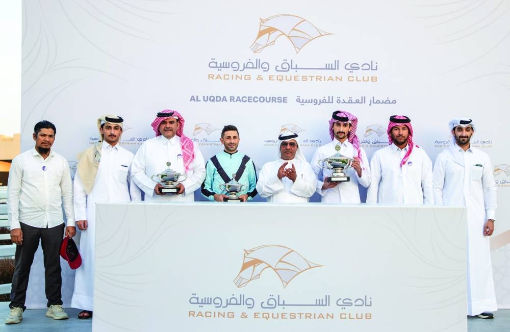 Connections of Account celebrate after winning the Lisha Cup at the Al Uqda Racecourse on Saturday. 
Pictures: Juhaim
