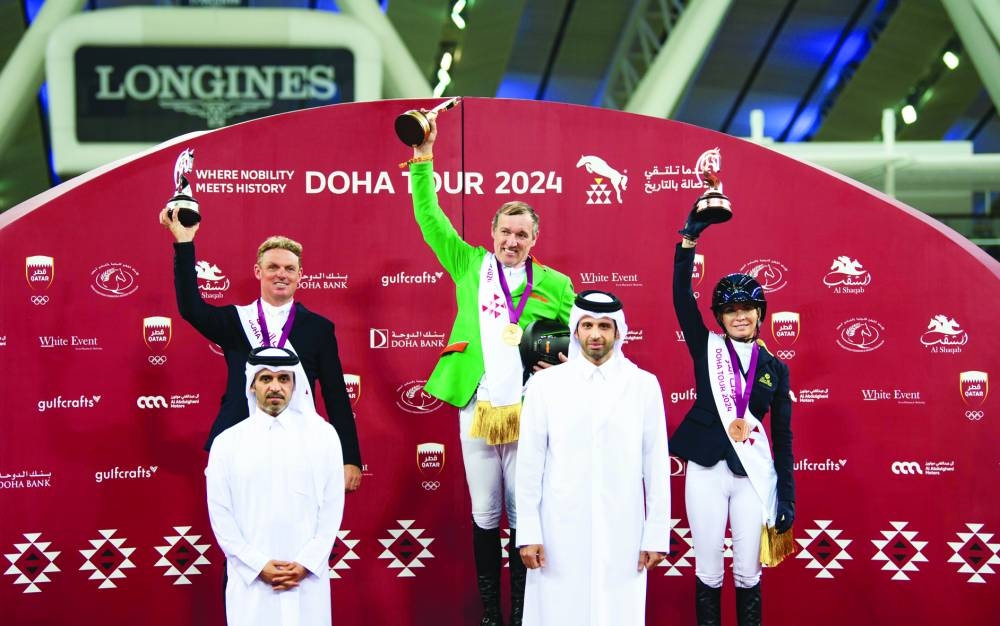 Qatar Equestrian Federation (QEF) Secretary-General and Chairman of Doha Tour Organising Committee Sheikh Ahmad bin Nooh al-Thani and QEF President Bader al-Darwish with the podium winners of CSI4* event at Al Shaqab on Saturday.
