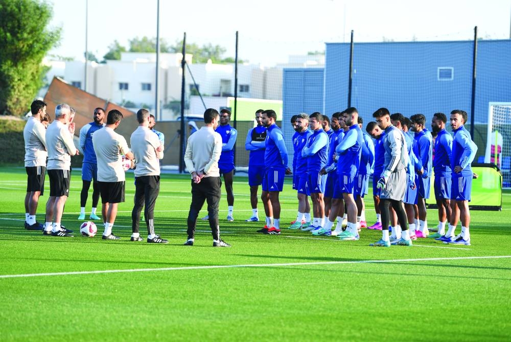The UAE players gather around for a team talk during a training session on Saturday, ahead of their AFC Asian Cup 2023 match against Hong Kong.